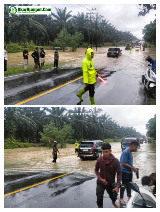 
					Babinsa Koramil 06/Marbau bersama aparat Polsek Kecamatan NA IX-X sigap turun ke lapangan untuk membantu mengatur arus lalu lintas dan memastikan keselamatan para pengguna jalan karena terjadi banjir yang diakibatkan curah hujan tinggi mengguyur wilayah Kecamatan NA IX-X di Jalan Lintas Desa Simpang Marbau, Kabupaten Labuhanbatu Utara, pada Jumat (04/04/2025) sekira pukul 17.00 WIB