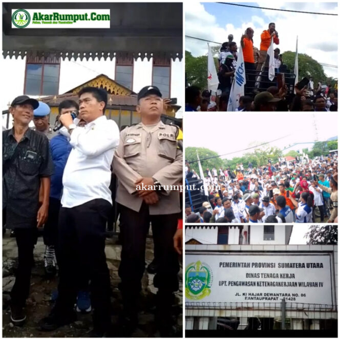 
					Ketua SPPK FSPMI Wardin saat melakukan orasi (Baju Orange), KUPT Wasnaker Wilayah IV Sumut Bangun N. Hutagalung saat menanggapi para pendemo (Baju Putih) beserta Ribuan massa buruh yang hadir