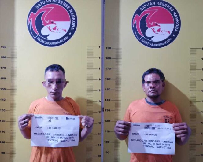 
					Terduga pelaku RS alias AL (38) (kiri) dan AFN alias F (41) (kanan) 