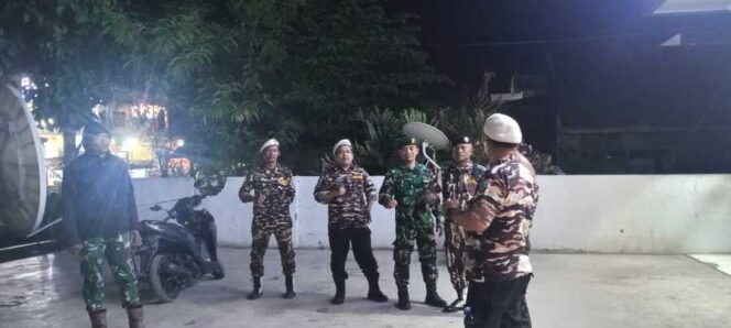 
					Patroli gabungan Babinsa Koramil 04/Labuhanbilik dan FKPPI di wilayah Kota Ajamu, Kecamatan Panai Hulu, Selasa (20/01/2026)