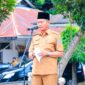 Asisten I Pemerintahan dan Kesra Setdakab Labuhanbatu Drs. Sarimpunan Ritonga, M.Pd., saat memimpin apel gabungan, Senin (11/05/2026)