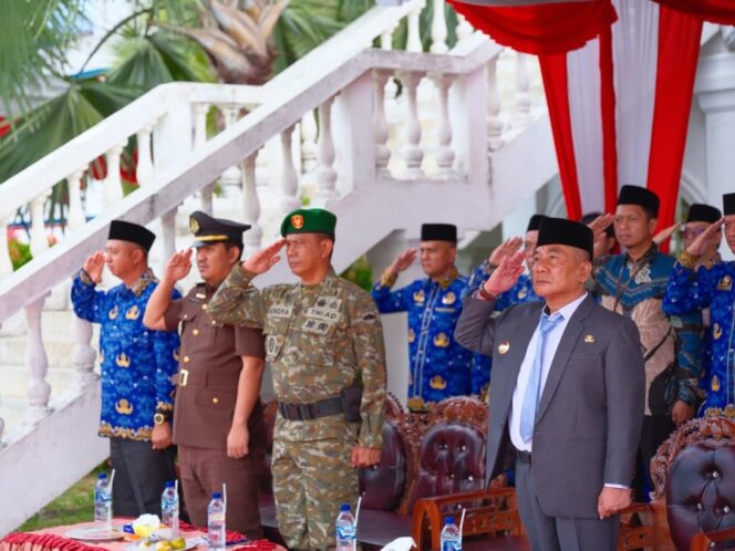 
					Danramil 11/KP Mayor Inf Hendra Gunawan bersama personel Koramil 11/KP, Forkopimda, Polri, ASN, dan masyarakat