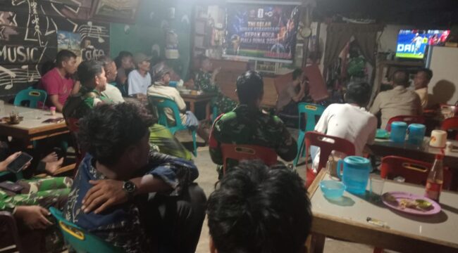 Koramil 03/SB Kodim 0209/Labuhanbatu menggelar nonton bareng Piala Dunia 2026 bersama masyarakat sebagai wujud nyata kemanunggalan TNI dengan rakyat