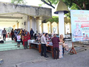 Polres Labuhanbatu membagikan 400 porsi makanan gratis kepada masyarakat dalam kegiatan Warung Polri Presisi Minggu ke-18 di Lapangan Ika Bina Rantauprapat